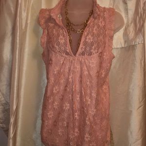 Light Pink top with floral design.